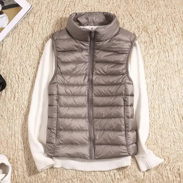 PUFFER GILET – SLEEVELESS HIGH COLLAR