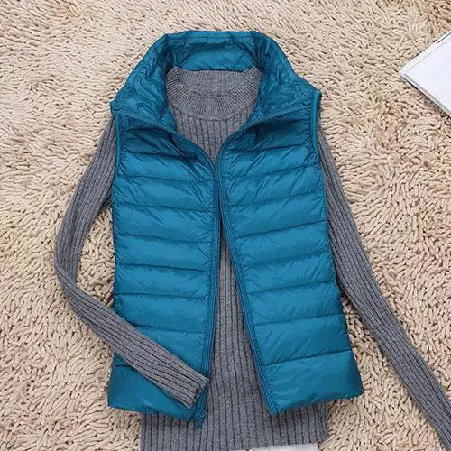 PUFFER GILET – SLEEVELESS HIGH COLLAR